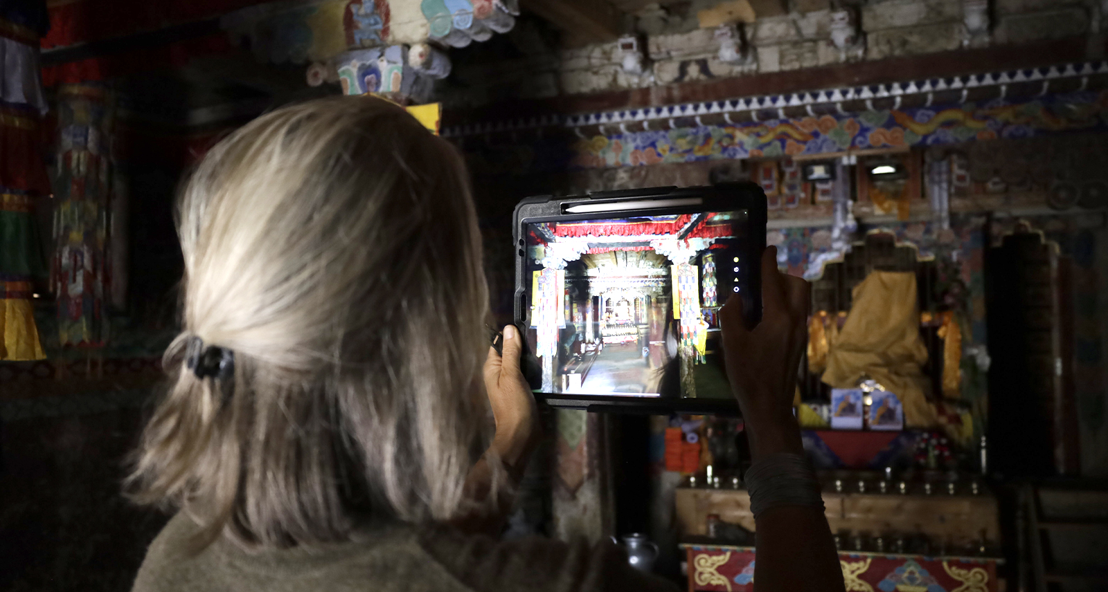 Team member Carmen Auer documenting Nezar Temple with photos taken on a Samsung S6 tablet to link to the Cyclone FIELD 360 app – Source: Peter Bauer 