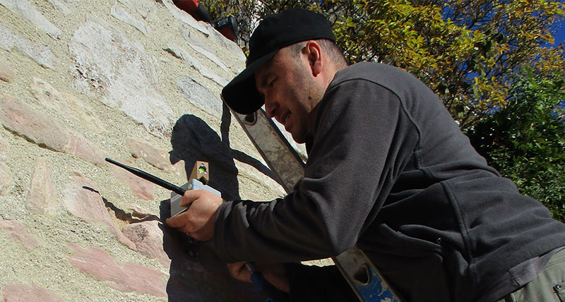 WiSen Geotechnical Sensor being installed on Historic Wall for monitoring