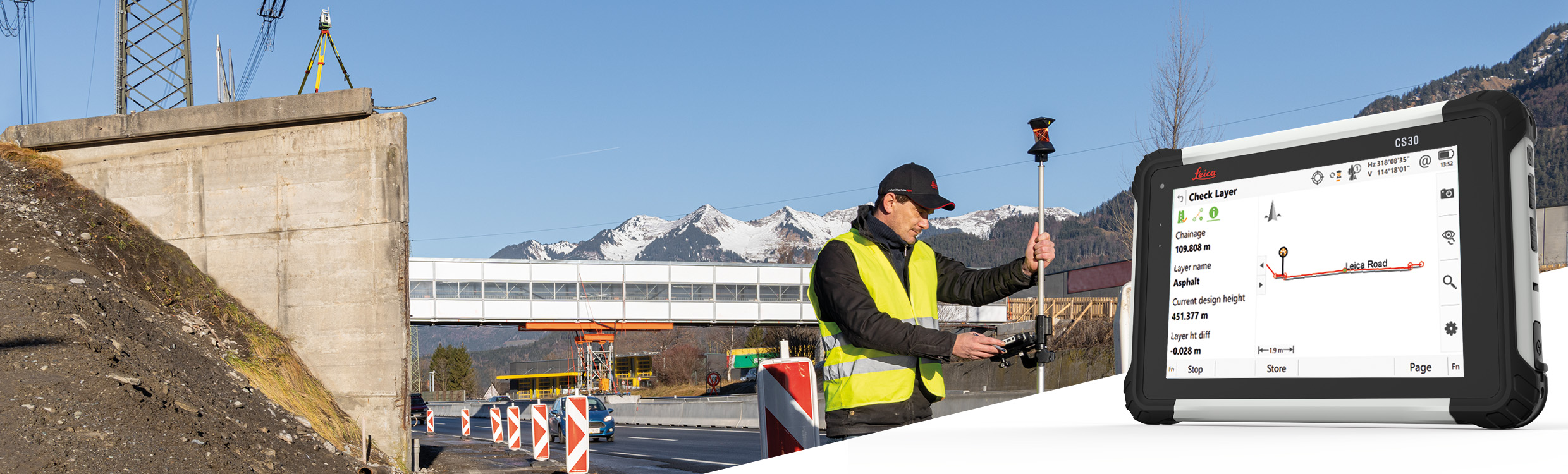 Surveyor performing a layer check on a busy road with with CS30 tablet showing the Leica Captivate field software.
